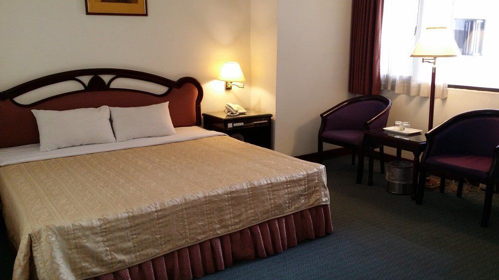 SunWang Hotel Puli Bagian luar foto