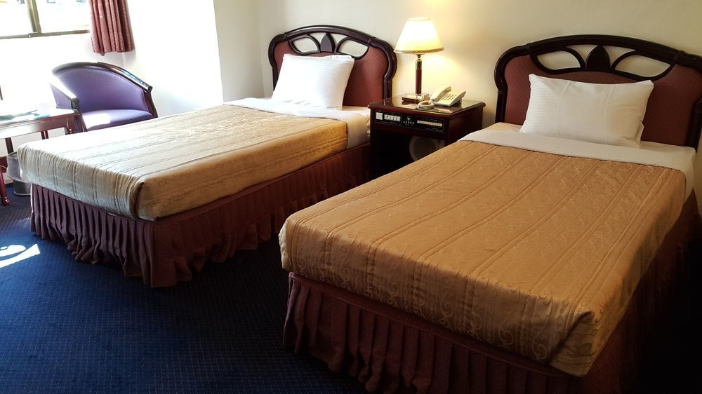 SunWang Hotel Puli Bagian luar foto