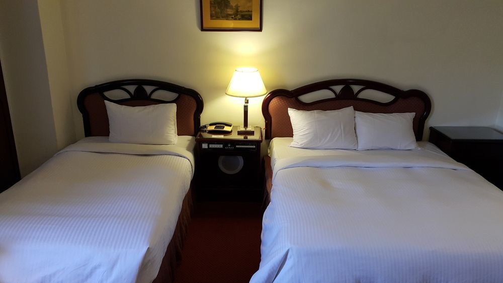 SunWang Hotel Puli Bagian luar foto