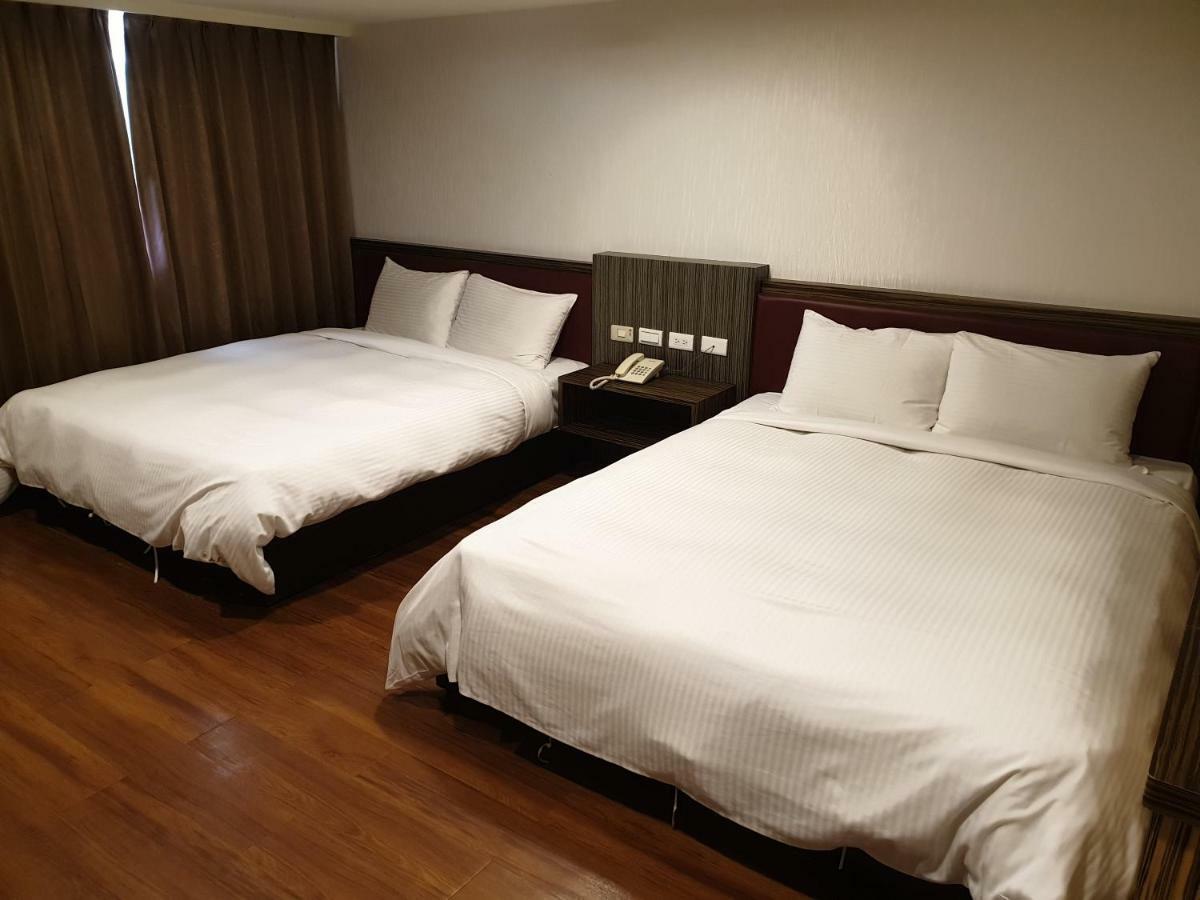 SunWang Hotel Puli Bagian luar foto